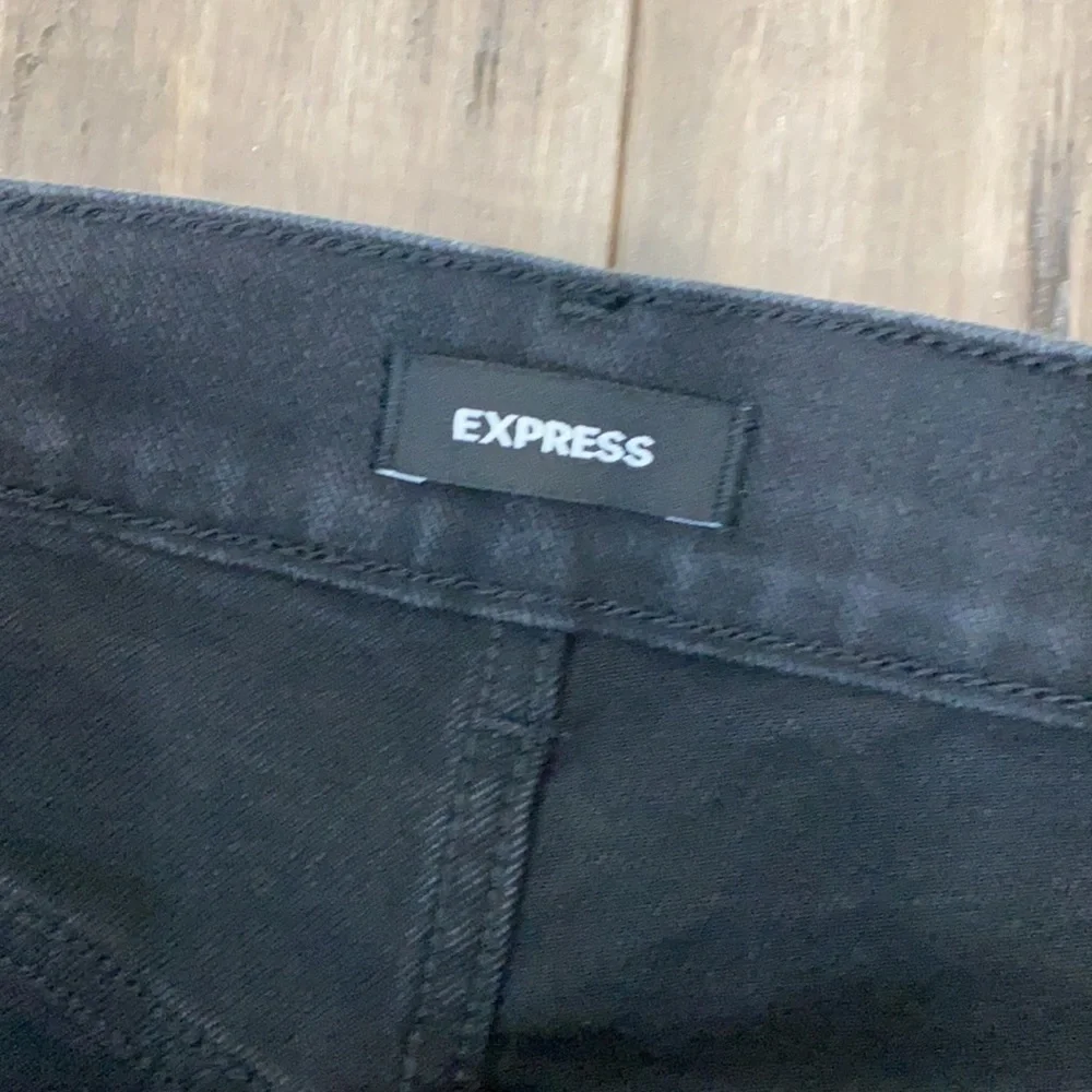 Express slim super high rise distressed jeans in black - Picture 7 of 14